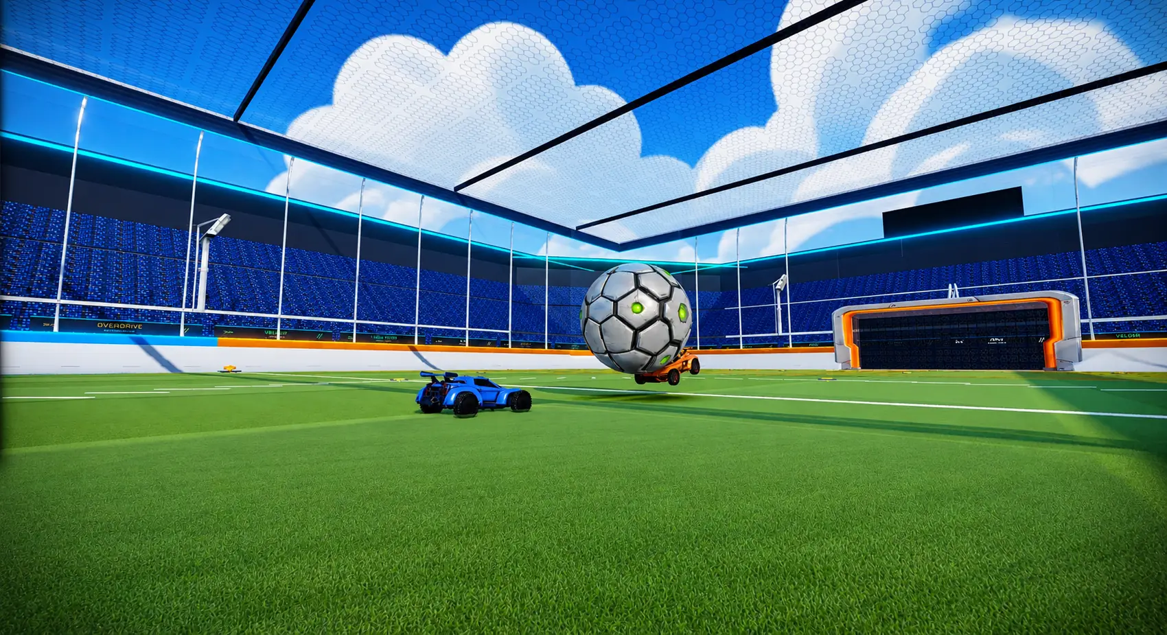 Cars and a giant soccer ball in a covered arena.
